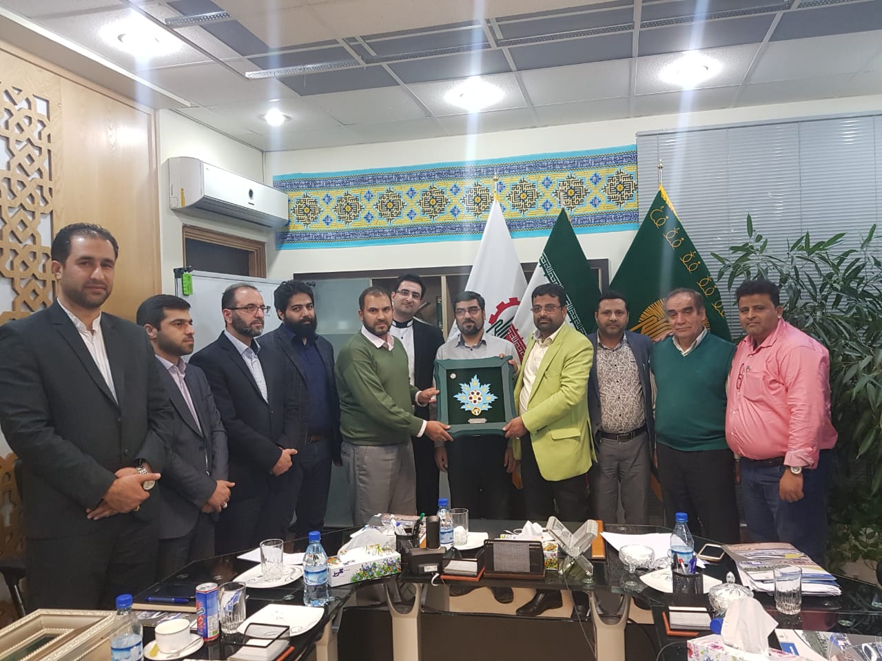 Mr Mohsin Shirazi and President Mr Mir Mumtaz Ali Sahab receiving mementos from Astan-e-Qods